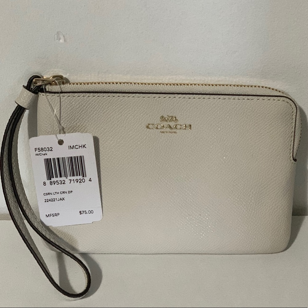 Brand new with tags off white Coach wristlet